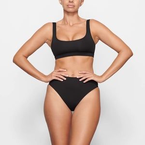 Skims swim top